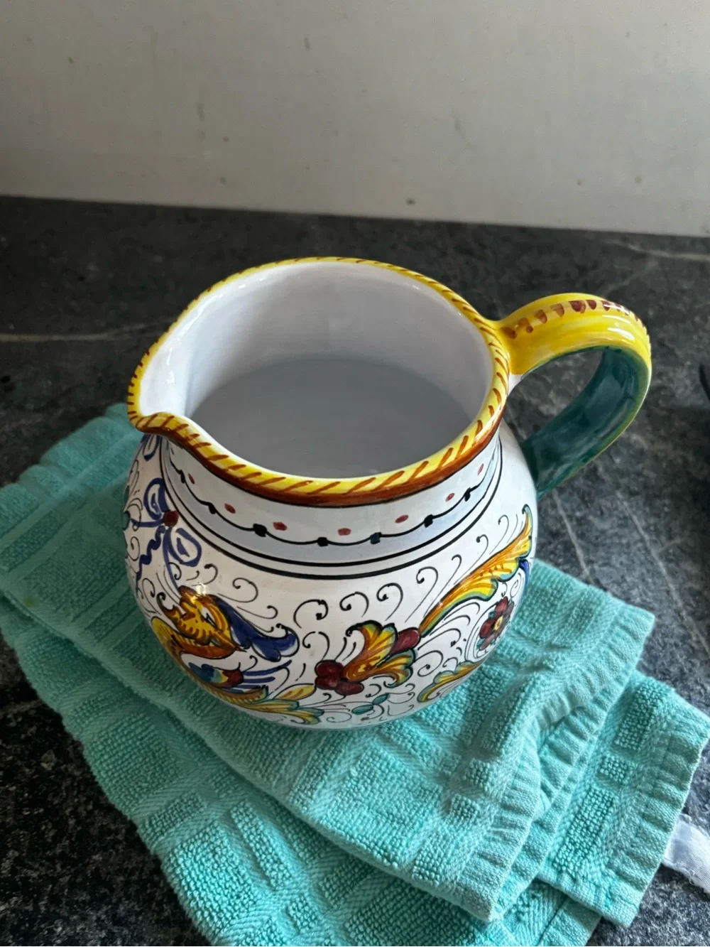 Hand-Painted White Ceramic Pitcher with Yellow, Blue and Green Motif